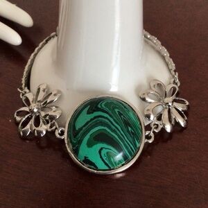 Silver tone bracelet with imitation malachite.